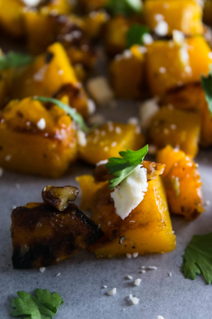 This roasted honey garlic butternut squash with feta and walnuts is packed full of flavor and so easy to put together. Perfect for Thanksgiving or any day when you want a special side dish. | www.thelastcookie.ca