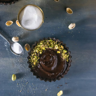 Gluten free pistachio crust with a silky smooth, seriously seductive dark chocolate filling. A truly indulgent Valentine's Day Dessert! | www.thelastcookie.ca