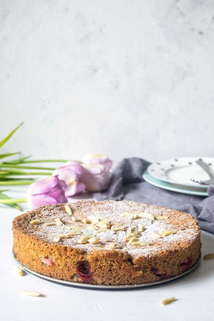 This Rhubarb Almond Gluten Free Cake is light, incredibly moist and easy to whip up. A simple but incredibly delicious celebration cake for spring and summer! | www.thelastcookie.ca