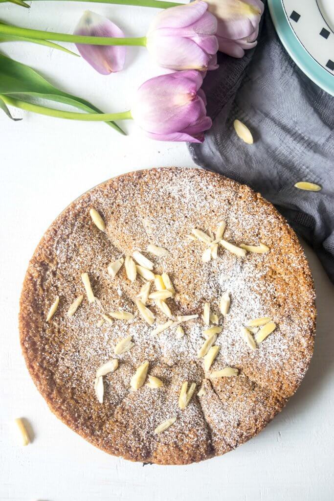 This Rhubarb Almond Gluten Free Cake is light, incredibly moist and easy to whip up. A simple but incredibly delicious celebration cake for spring and summer! | www.thelastcookie.ca