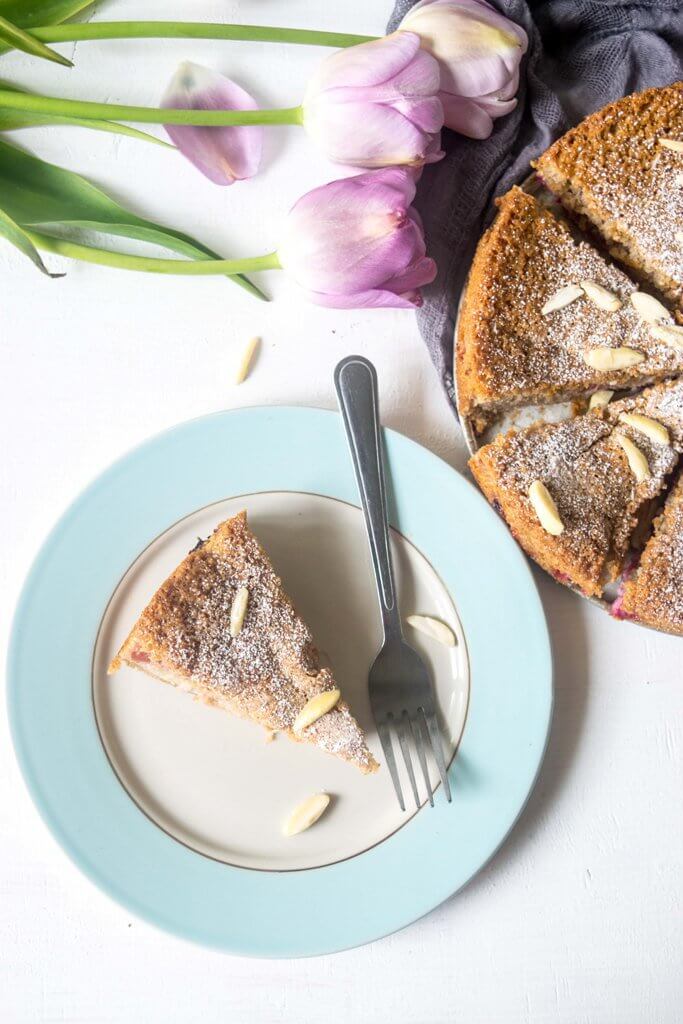 This Rhubarb Almond Gluten Free Cake is light, incredibly moist and easy to whip up. A simple but incredibly delicious celebration cake for spring and summer! | www.thelastcookie.ca