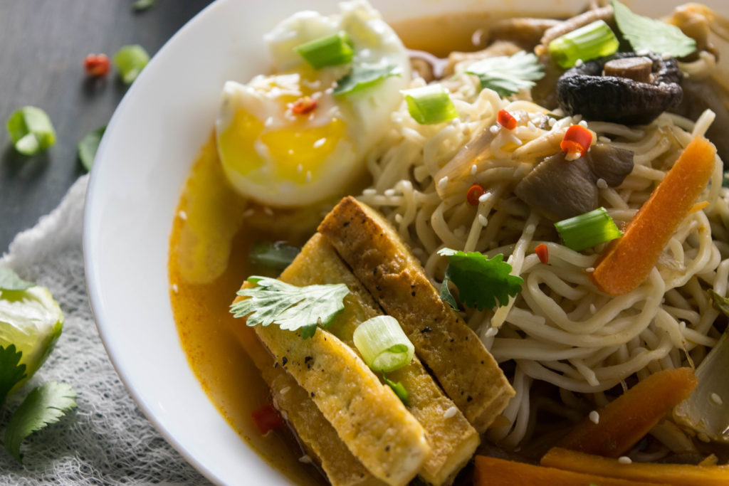 A spicy vegetarian Ramen with a deep, complex broth, plenty of vegetables and a delicious umami flavor that will guarantee everyone asking for seconds! | www.thelastcookie.ca